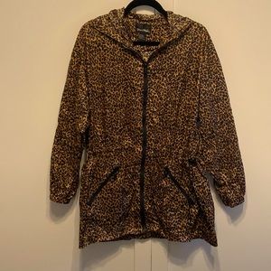 Like new ShedRain cheetah print packable rain jacket with hood size M/L